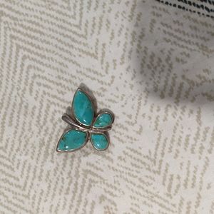Sterling silver and turquoise butterfly necklace charm.